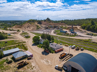 Aerial view from drone to sand pit, sunny day