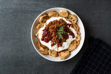 Turkish Manti with Yogurt, Minced Meat and Fried Butter Sauce From Artvin called Silor / Siron / Ziron Rolled Raw Dough and Fried Phyllo / Manlama