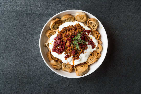 Turkish Manti with Yogurt, Minced Meat and Fried Butter Sauce From Artvin called Silor / Siron / Ziron Rolled Raw Dough and Fried Phyllo / Manlama