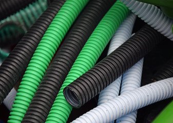 green, white and black cable ducts