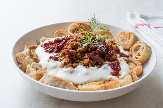 Turkish Manti with Yogurt, Minced Meat and Fried Butter Sauce From Artvin called Silor / Siron / Ziron Rolled Raw Dough and Fried Phyllo / Manlama