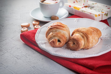 Breakfast - croissants and coffee, sweets copy space. Ideal for cafe menu.