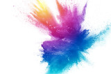 Abstract multi color powder explosion on white background.  Freeze motion of  dust  particles splashing. Painted Holi in festival