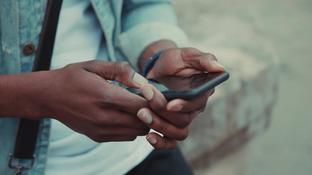 Close Up Hands Young African American Man Uses The Phone And Smartwatch At The Street Business Shopping Internet Face Technology Call Texting Mobile Smart Attractive Cell Communication Slow Motion