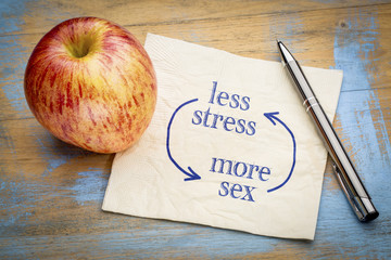 less stress, more sex - concept on napkin