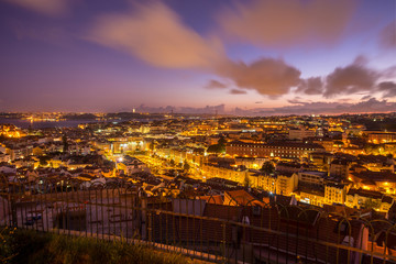 Twilight city view of Lisbon from the Nossa Senhora do Monte belvedere, Portugal