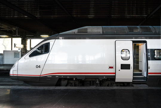 Fototapeta Modern high speed train on railway station in Madrid