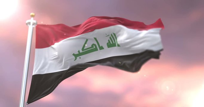 Flag of Iraq waving at wind in slow at sunset, loop