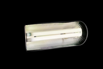 fluorescent lamp on black background