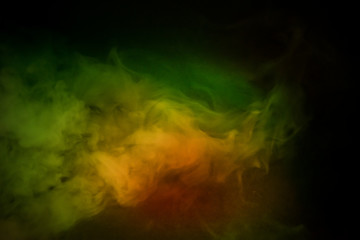yellow smoke on a black background
