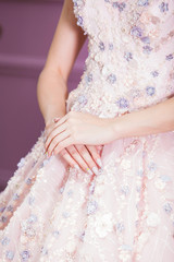 Pink wedding dress detail and bride