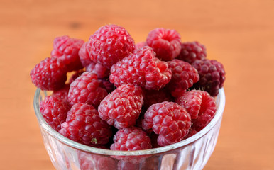 raspberries in a glass bowl