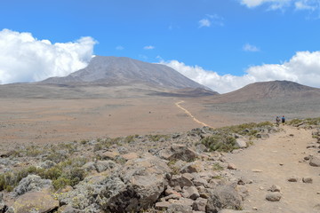Hikers slowly making their way to Kibo Hut, Mount Kilimanjaro