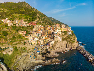 Fototapeta na wymiar Manarola - Village of Cinque Terre National Park at Coast of Italy. Province of La Spezia, Liguria, in the north of Italy - Aerial View - Travel destination and attractions in Europe.