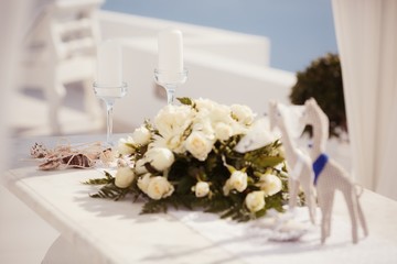 Bridal wedding bouquet of flowers on wedding day on Santorini