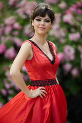 Beautiful young lady in red dress