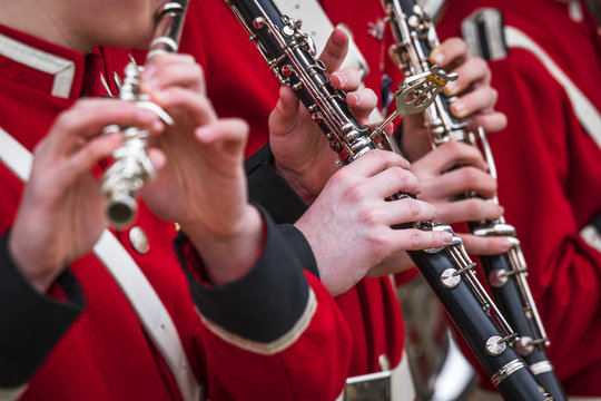 Clarinet musicians in red uniform
