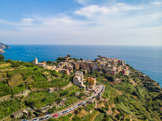 Obraz premium Corniglia - Village of Cinque Terre National Park at Coast of Italy. Province of La Spezia, Liguria, in the north of Italy - Aerial View - Travel destination and attractions in Europe.