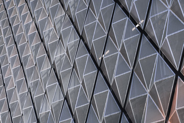 Facade metal surface in the form of tesselated rhombuses