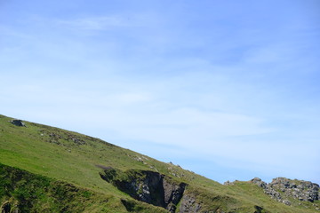 Fototapeta na wymiar hill with blue sky