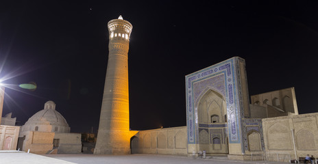 Mir-i Arab Madrasah entrance, Historic centre of Bukhara, Uzbekistan. UNESCO World Heritage. Night...