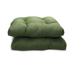 green soft pillows on chair isolated on white background