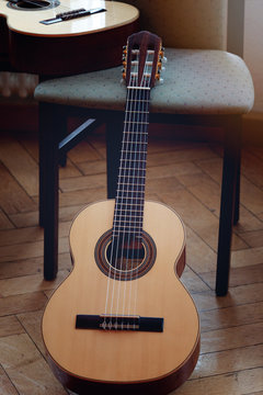  Guitar on Wood Floor
