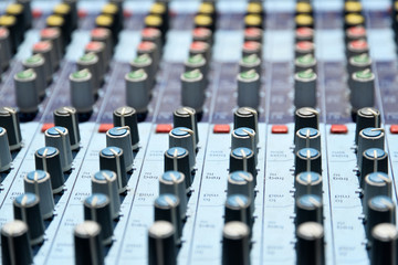 Close up of music mix console at music studio