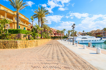 Promenade with beautiful colorful houses in Sotogrande marina, Costa del Sol, Spain