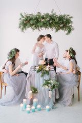 People Cling Champagne Glasses on Wedding Reception with Bride and Groom