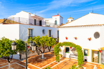 Square with typical white houses in small village near Marbella. Andalusia, Spain