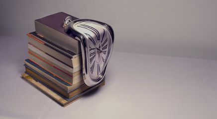 Clocl Melting On Books