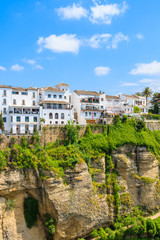 White houses on cliff in Andalusian village of Ronda, Spain