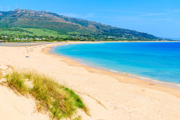 Sandy Paloma beach and view of sea bay, Andalusia, Spain