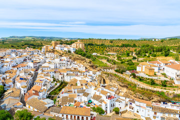 Fototapeta na wymiar White houses in beautiful village of Sentinel de las Bodegas, Andalusia, Spain