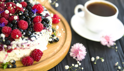 Cheese cake on wooden table.