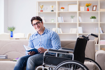 Young student on wheelchair in disability concept