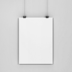 Blank poster hanging on a wall mockup