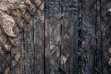 Burned dirty wall after fire, old grunge texture