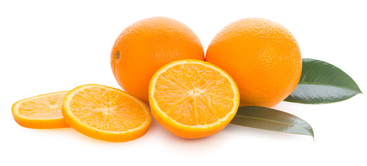 Fresh juicy oranges with slices and green leaves. Isolated on a white background.