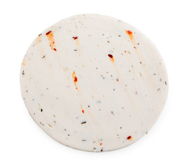 Single round slice of very tasty cheese with spices isolated on white background, top view.