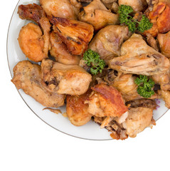 Dish with slices of fried chicken isolated on a white background with empty space for your text.