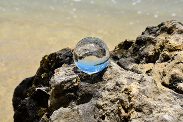 Fototapeta na wymiar Sphere on a rock