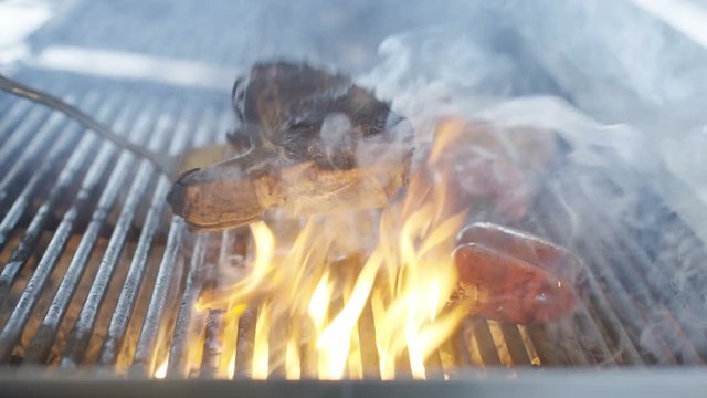 Cheff preparing meat meal in kitchen. 