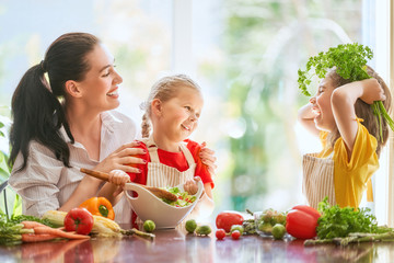 Happy family in the kitchen.