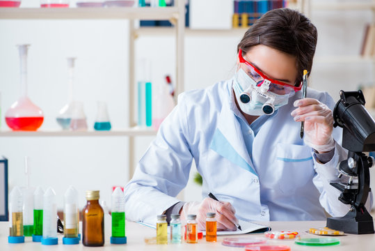 Lab assistant in drug synthesis concept