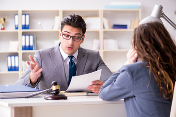 Lawyer discussing legal case with client