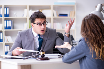 Lawyer discussing legal case with client