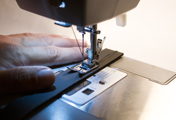 Sewing machine. Close-up of the hook and feet on the sewing machine