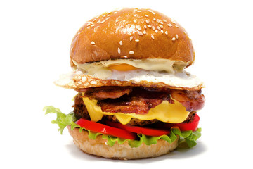Juicy burger of beef on a white background. Side view